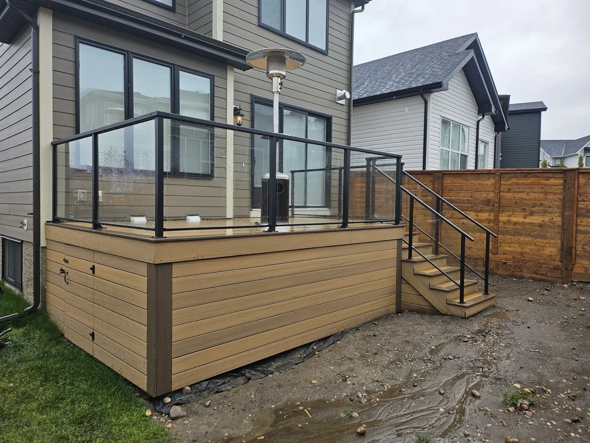Premium PVC deck with glass railing — Calgary