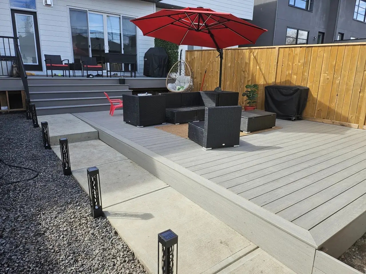 Deck replacement service — old wood deck replaced with composite in Calgary