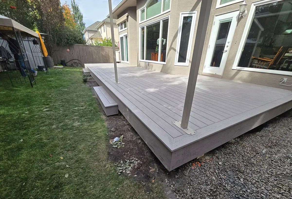 Featured outdoor deck and patio space built by Serenity Construction