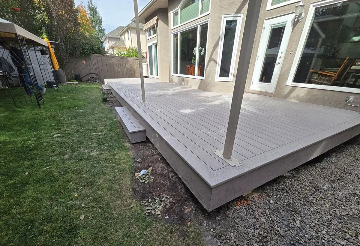 Featured outdoor deck and patio space built by Serenity Construction