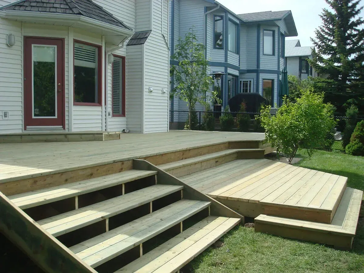 Variety of pool deck materials including wood, composite, and stone, showcasing textures and colors for material selection